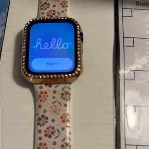 Apple Smartwatch with Gold Frame and Floral Band